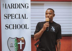 International wheelchair tennis star Alwande Sikhosana returns to Harding Special School, where his journey began